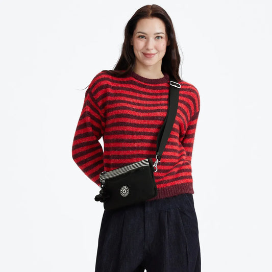 RIRI ZIP Stripe Black Bl $833 mensuales 3msi*